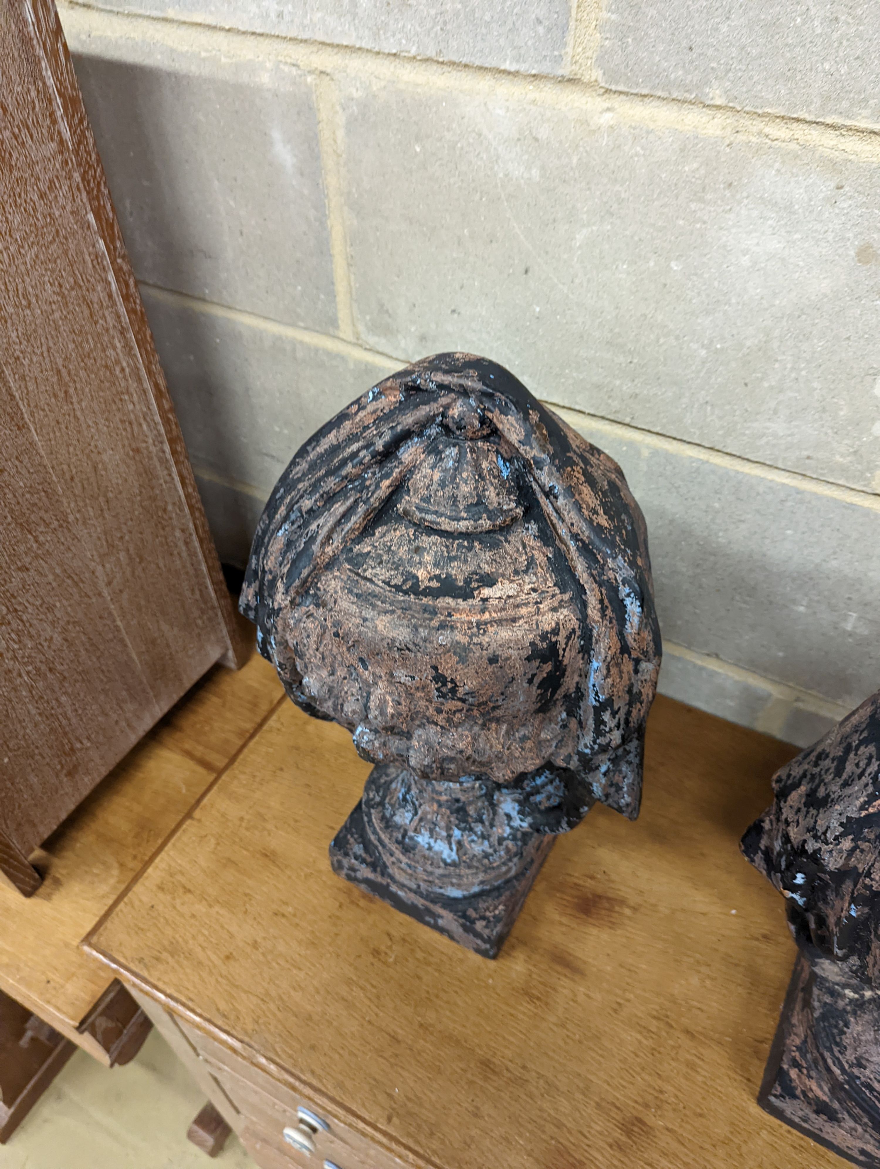 A pair of cast iron urn shaped finials. H-48cm.